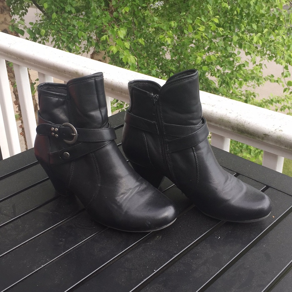 Black synthetic leather ankle boots